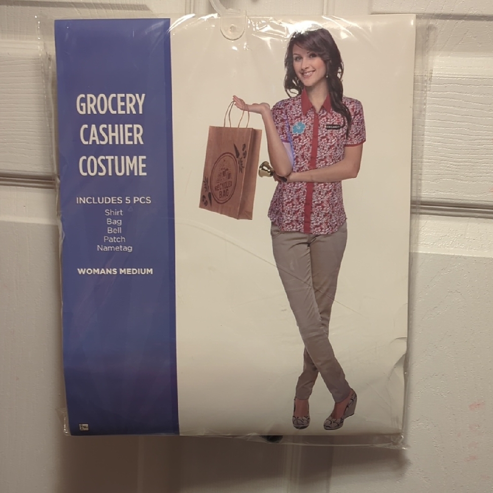 Grocery cashier costume includes shirt, bag, belt, patch, and nametag brand new